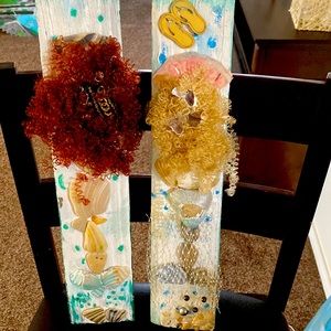 Hand painted on old wood.